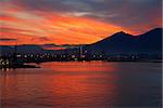 The industrial port of Messina Italy at dawn