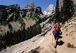 Mountaineers trekking to base camp to climb the Grand Teton