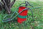 Old-fashioned weed sprayer in a garden