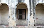 Wall of an old dilapidated building in an old block of Georgetown, Malaysia