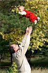 young father playing with his son