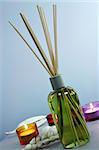 Diffuser with sticks and candles