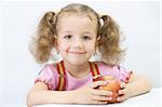 Portrait of the pretty girl with an apple, over white