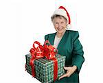 A pretty grandmother in a Santa hat giving you a gift.  Isolated on white.