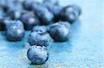 Blueberries on  blue background