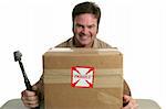A delivery man with a package marked fragile.  He is about to hit it with a hammer.