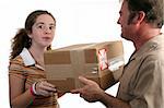 a girl receiving a package and looking surprised - isolated