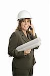 A happy, smiling female architect holding blueprints and talking on her cellphone.  Isolated.