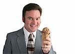 A businessman holding an ice cream cone and smiling a big grin. Isolated.