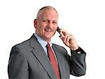 a happy businessman talking on his cell phone - isolated