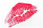 Lipstick kiss on writing paper