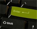 Close-up picture of a computer keyboard - green key enter