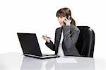 Business woman working in the office with a Laptop and Phone