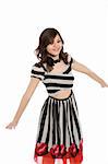 happy girl in black and white stripes dress stretching hands