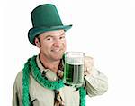 Man celebrating his Irish heritage on St. Patrick's Day, making a toast with green beer.