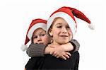 Two brothers with Christmas hats. On white background.