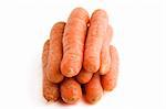 Large group of carrots on a white background