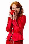 modern dressed woman holding red apple