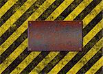 old grungy yellow hazard stripes with rusted metal plaque