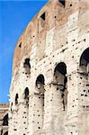 Closeup of the exterior of the Colosseum in Rome, Italy.