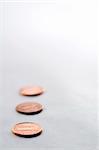 Row of pennies with a shallow depth of field