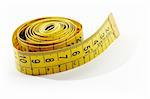 isolated measuring tape in yellow