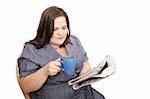 Beautiful plus-sized woman reading the newspaper and drinking coffee.  Isolated on white.