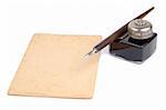 Old fashioned pen, ink-pot and piece of paper isolated over white background
