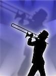 Trumpet player silhouette in the blue lights