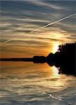 beautiful summer sunset reflected in a lake