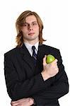 A businessman in a suit with an apple