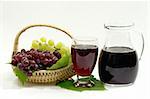 Red Grape Juice with a Jug on bright Background