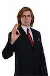 businessman in a suit showing gesture ok all well