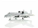 military miniature toy airplane on white background