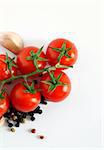 Close up of fresh tomatoes over white. Nice food background