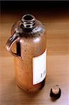 opened duch alcohol bottle on wooden table