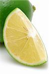 Cutted slice of lime in isolated white background