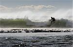 Surfing the break at Haumoana Beach, Hawke's Bay, New Zealand