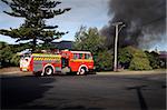 Firemen attend a house fire in Haumoana, New Zealand