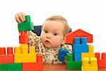 Cute baby girl with colorful blocks isolted background