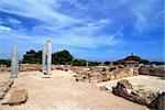 Ancient Sardinian ruins of Nora with sea and lighthouse