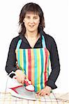 A housewife in apron holding a eletric iron