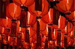 photo of chinese red paper lantern inside temple