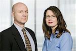 Portrait of Businesswomen and Businessman in an Office