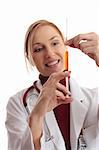 A doctor preparing and checking a needle syringe.