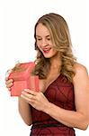 Attractive female excited by surprise Christmas present