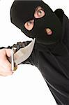 crazy evil criminal wearing balaclava with a knife