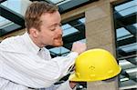 Details an successful architect cleaning helmet