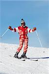 Happy ski girl in red