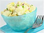 A delicious bowl of creamy potato salad.